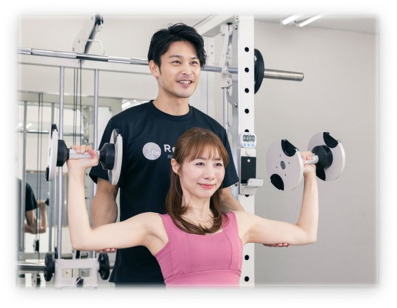 専属トレーナーと会員さまが目標について話し合っている様子